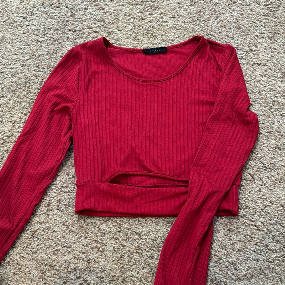 Red, center cut long sleeve shirt.
